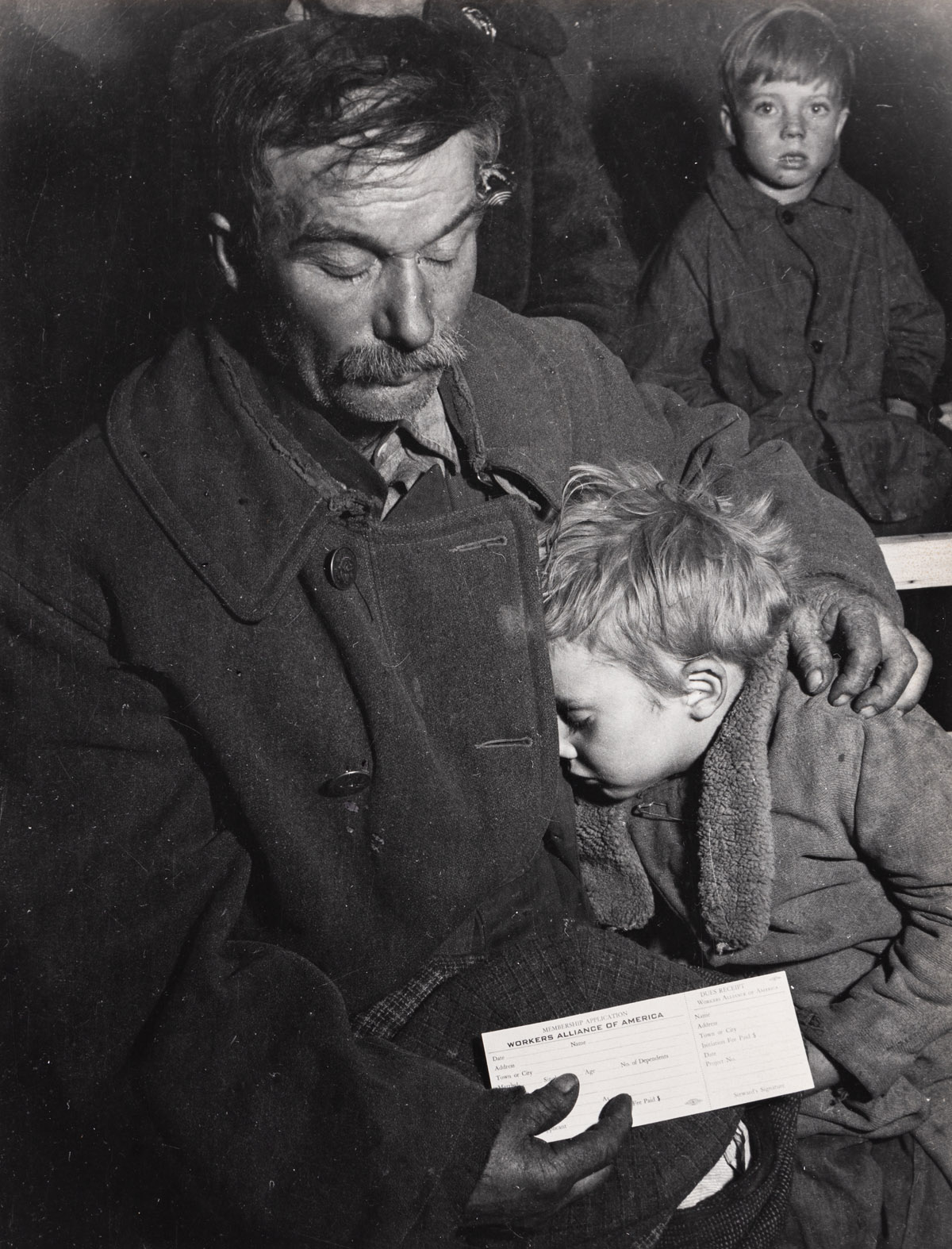 HANSEL MIETH (1909-1998) Unemployed father with son at Workers Alliance Meeting, North Platte, Neb.